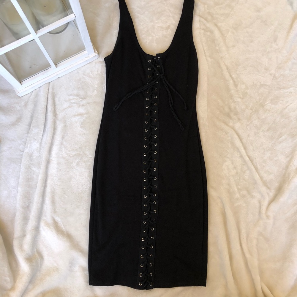 Naked wardrobe black lace up dress